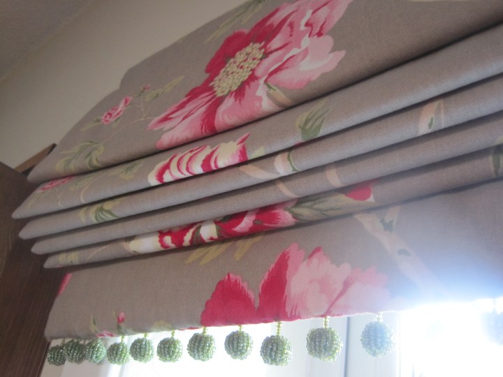 Roman blind with bobble trim